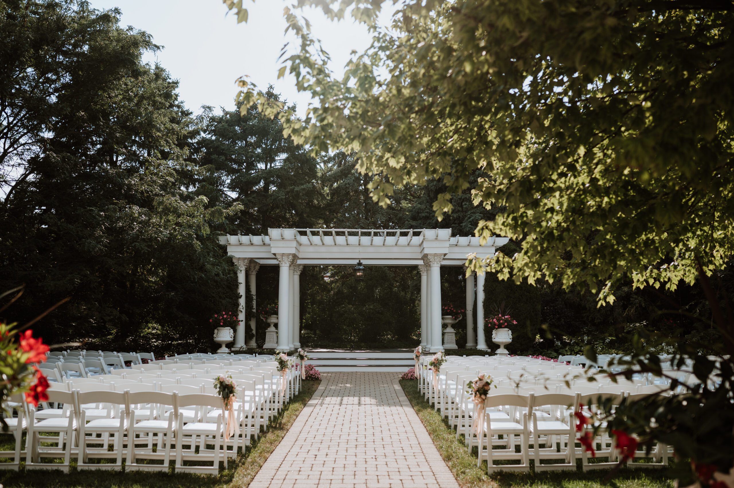 Outdoor wedding ceremony space at The Haley Mansion with chairs