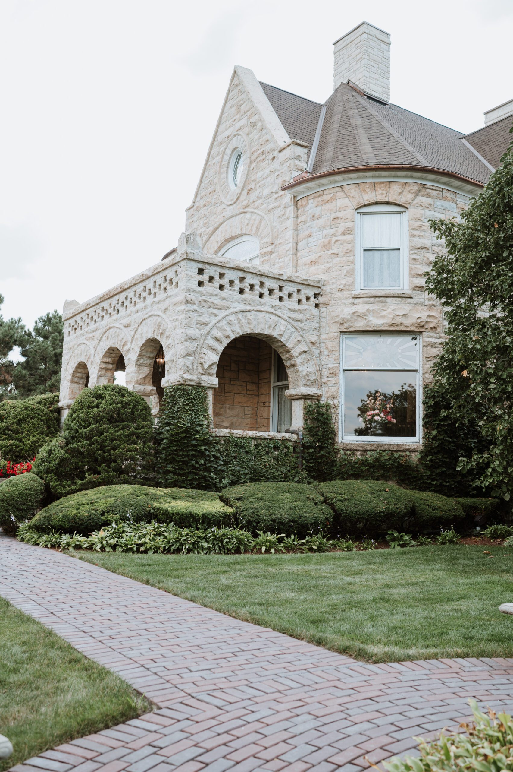 Exterior of The Haley Mansion in Joliet, IL with historic stone architecture