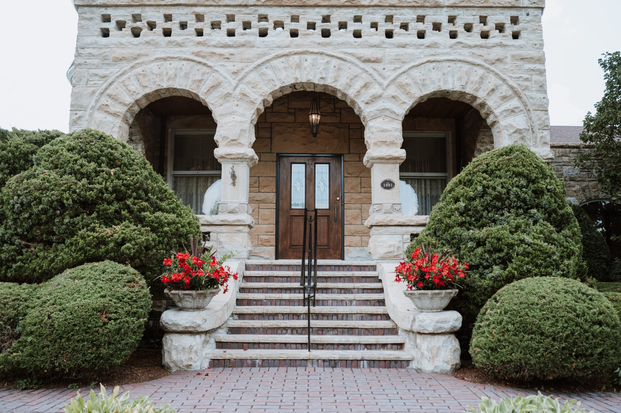 Exterior of The Haley Mansion in Joliet, IL with historic stone architecture