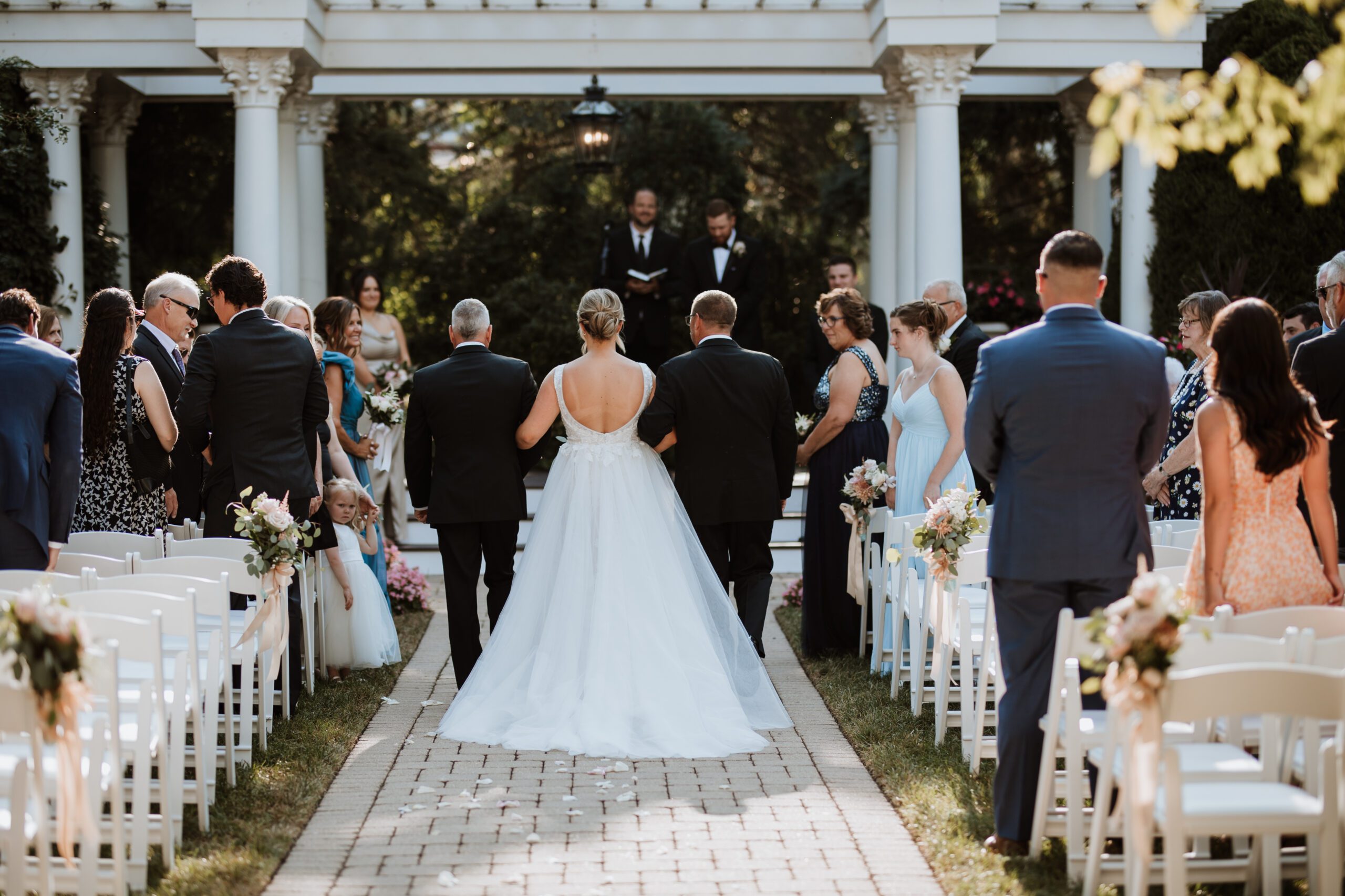 Bride walking down the aisle at The Haley Mansion