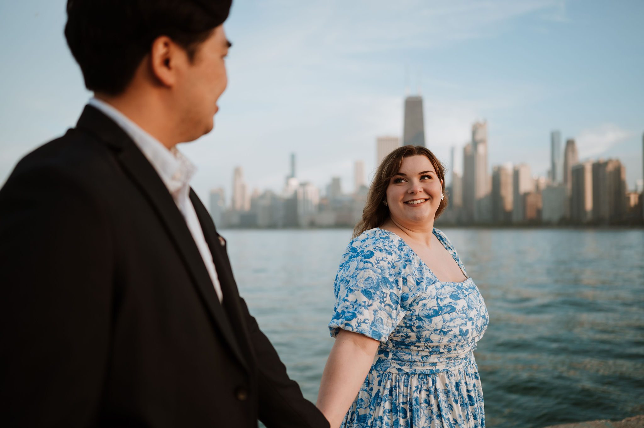 Engagement photos at North Avenue Beach Chicago skyline background