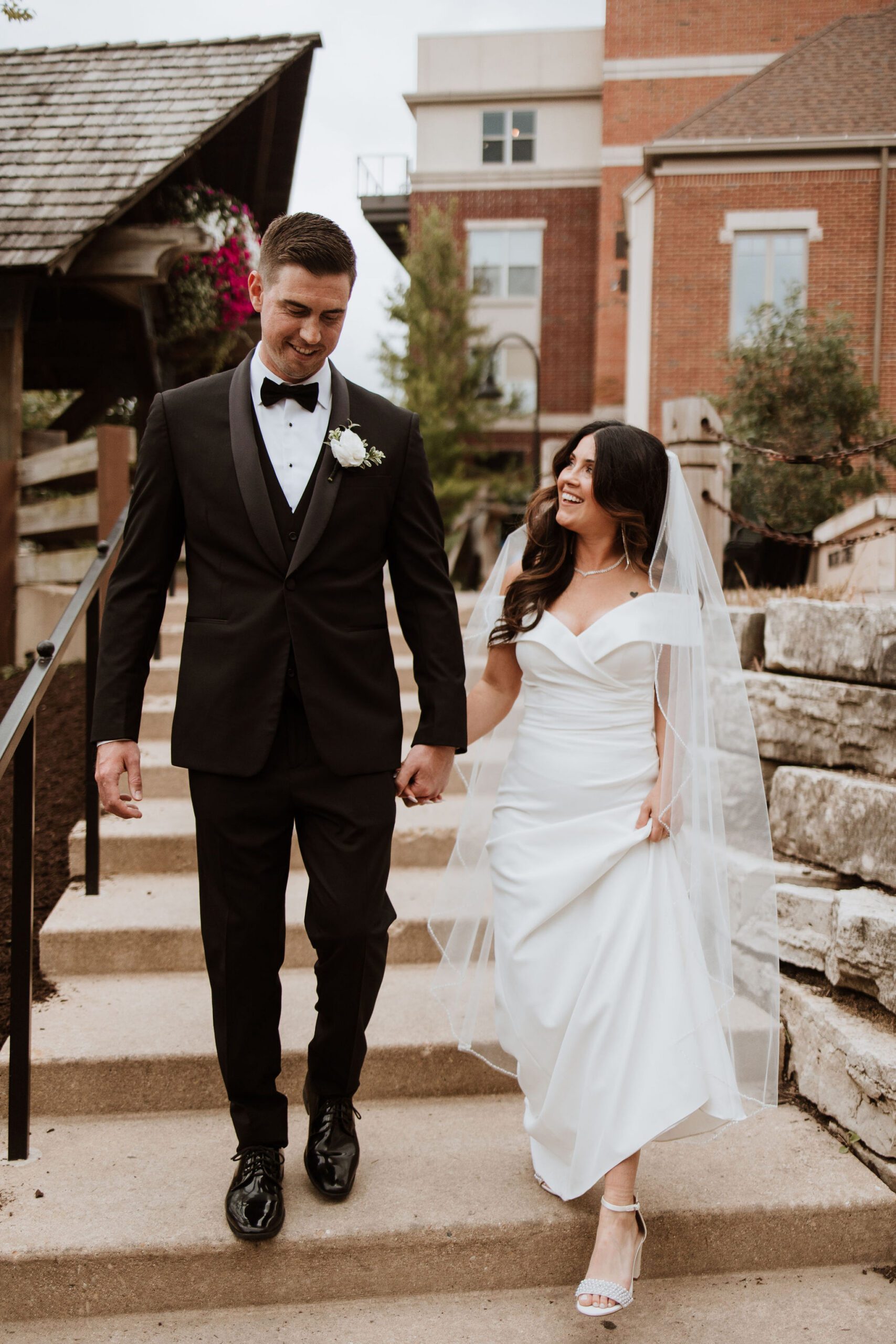 Wedding photo location at Naperville Riverwalk with river views